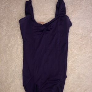 motion wear woman’s purple leotard